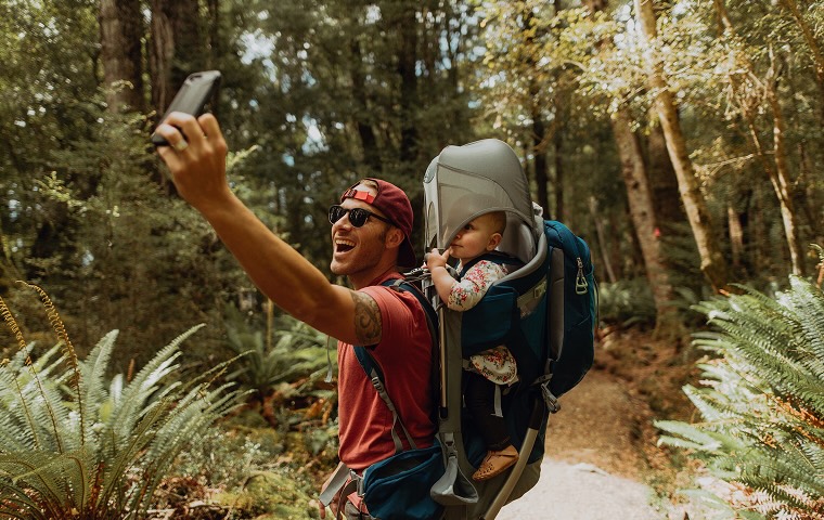 Two people looking at a phone